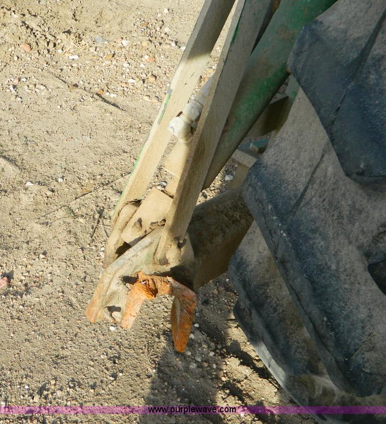 image for item D8640 2004 John Deere 4995 swather