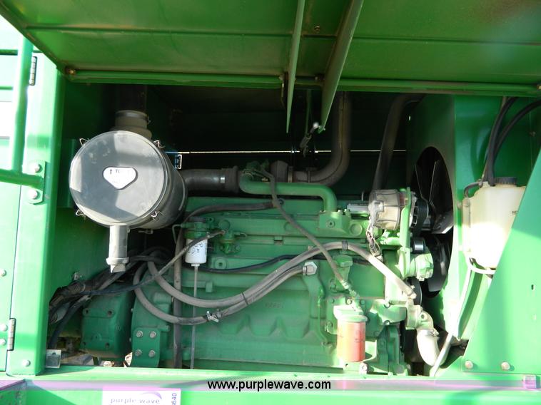 image for item D8640 2004 John Deere 4995 swather