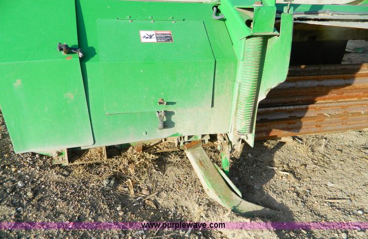 image for item D8640 2004 John Deere 4995 swather