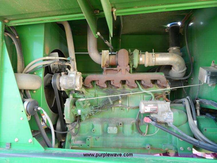 image for item D8640 2004 John Deere 4995 swather