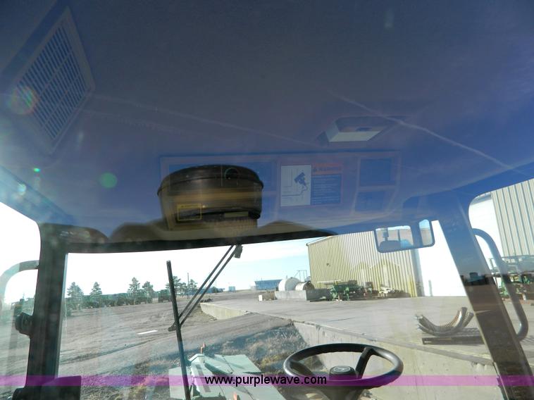 image for item D8640 2004 John Deere 4995 swather