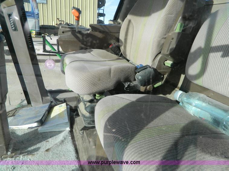 image for item D8640 2004 John Deere 4995 swather