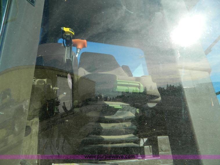 image for item D8640 2004 John Deere 4995 swather