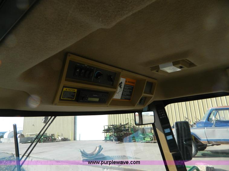 image for item D8640 2004 John Deere 4995 swather