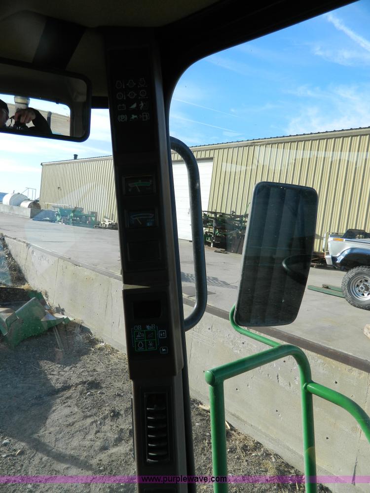 image for item D8640 2004 John Deere 4995 swather