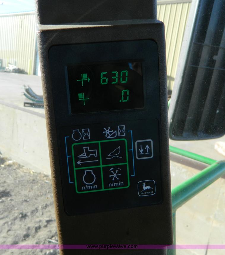 image for item D8640 2004 John Deere 4995 swather