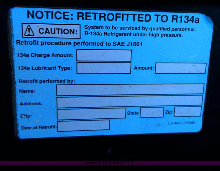image for item D8653 1990 Gleaner R60 combine and 24' rigid platform