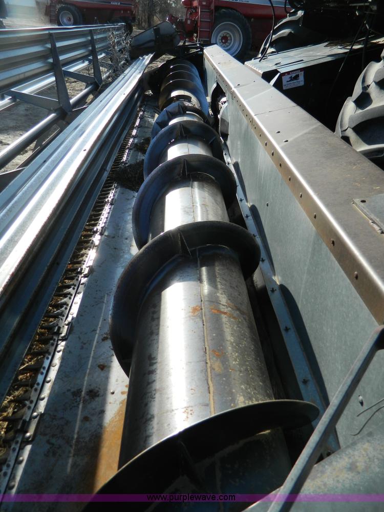 image for item D8653 1990 Gleaner R60 combine and 24' rigid platform