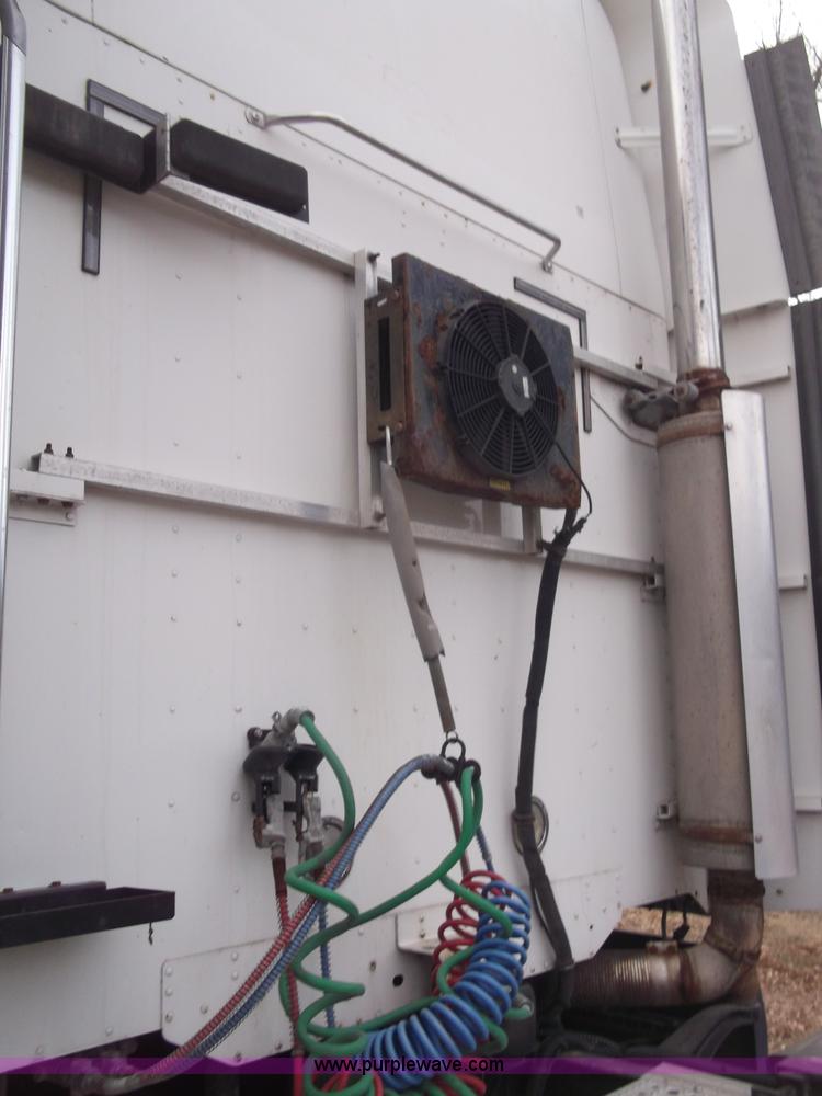 image for item B5076 2004 Freightliner ST120 semi truck