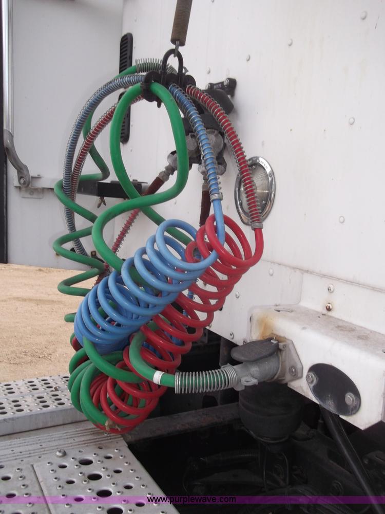 image for item B5076 2004 Freightliner ST120 semi truck