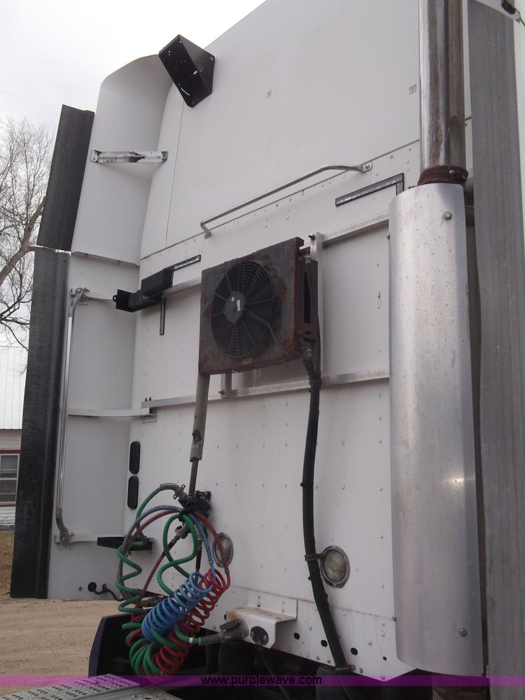 image for item B5076 2004 Freightliner ST120 semi truck