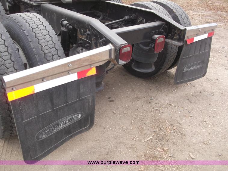 image for item B5076 2004 Freightliner ST120 semi truck