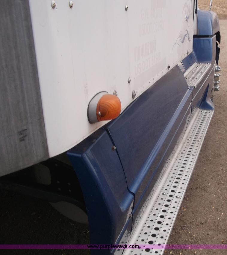 image for item B5076 2004 Freightliner ST120 semi truck