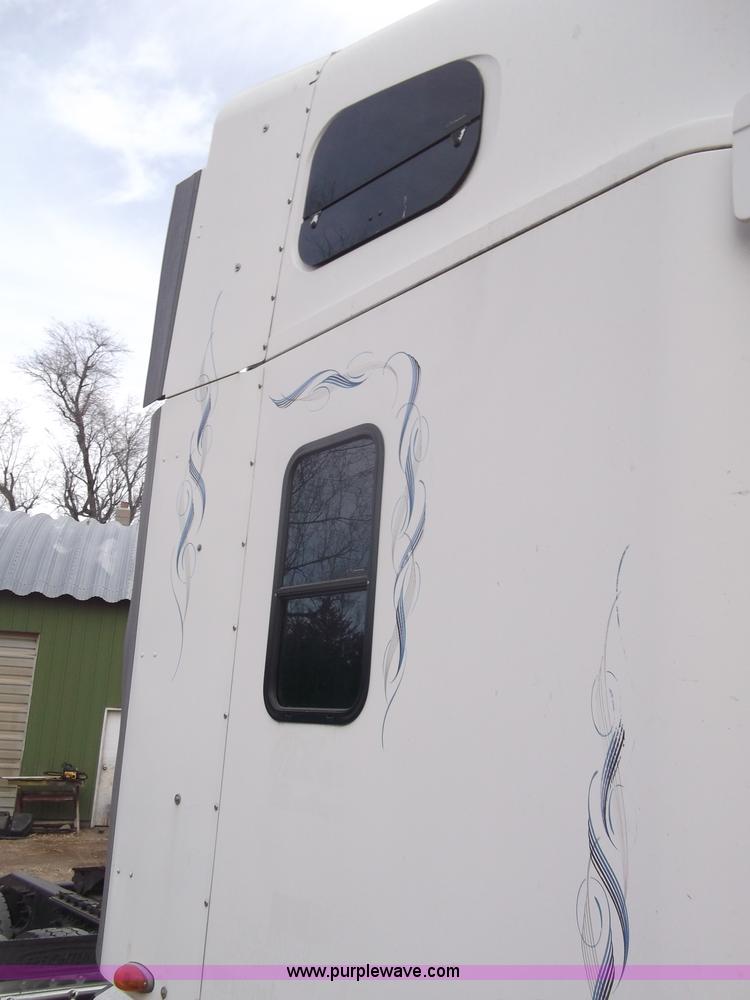 image for item B5076 2004 Freightliner ST120 semi truck