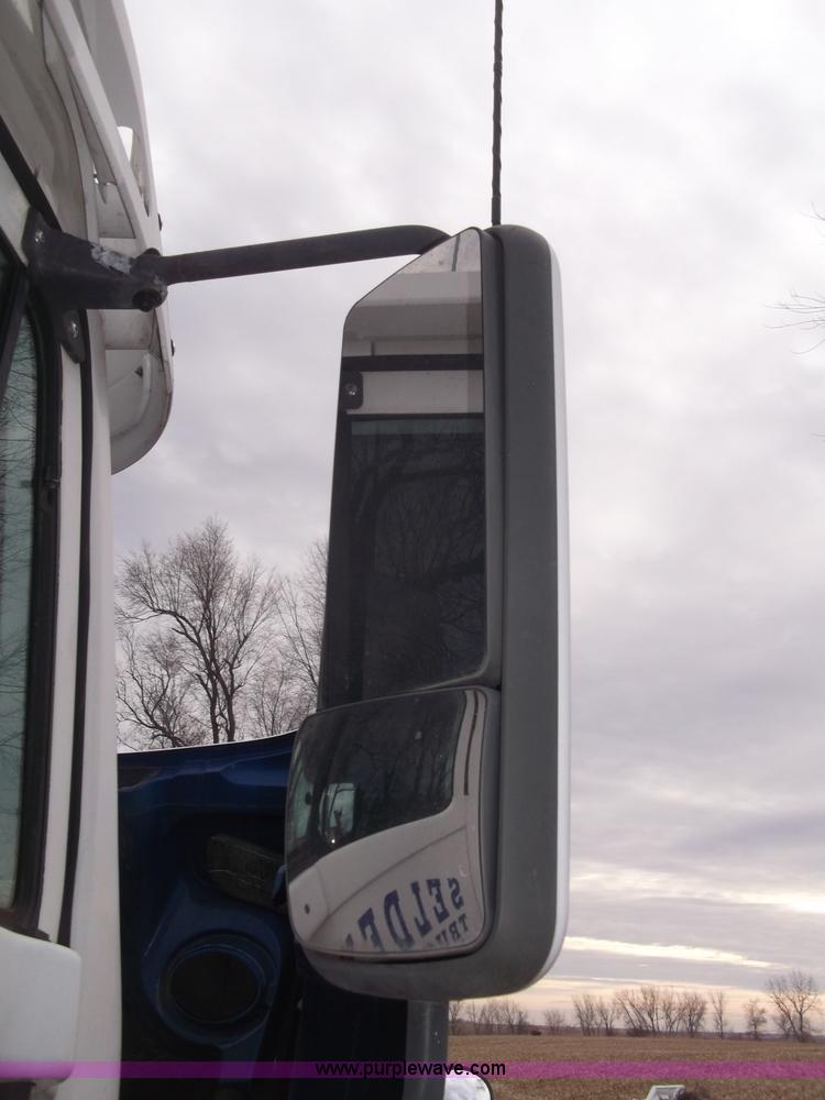 image for item B5076 2004 Freightliner ST120 semi truck