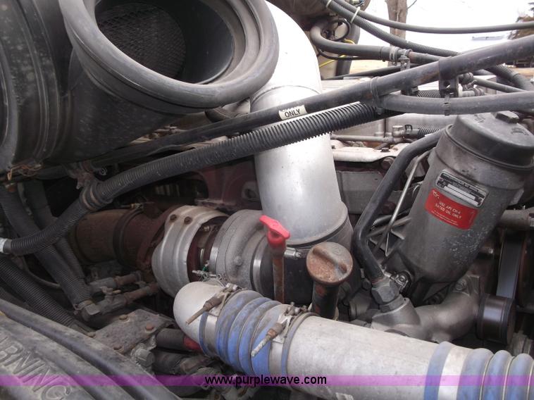 image for item B5076 2004 Freightliner ST120 semi truck