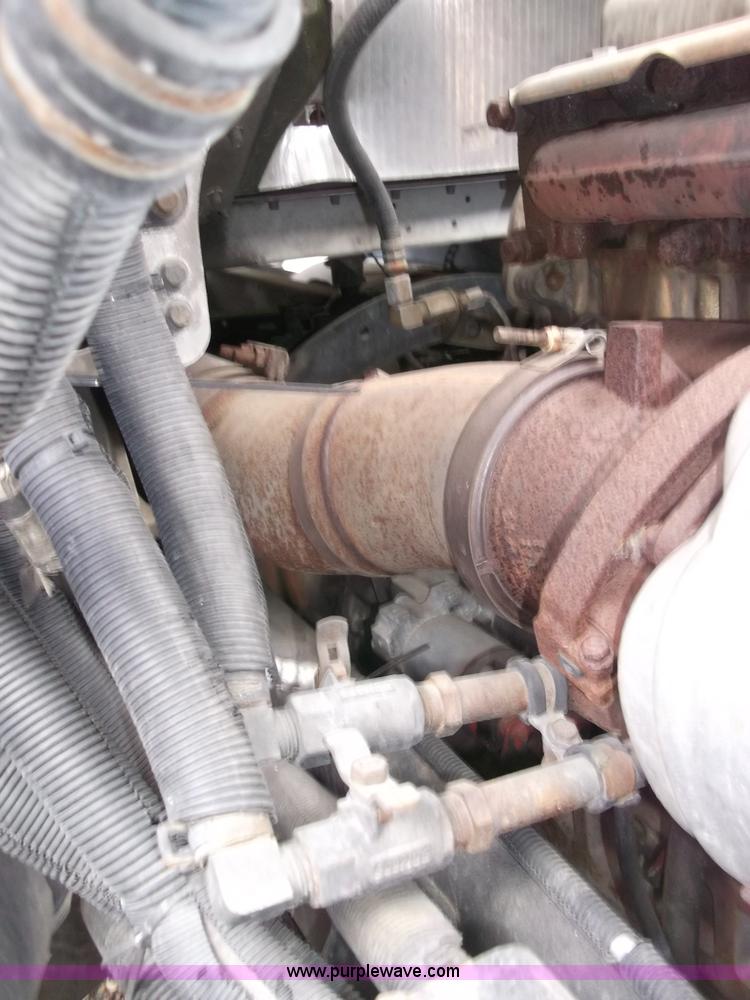 image for item B5076 2004 Freightliner ST120 semi truck