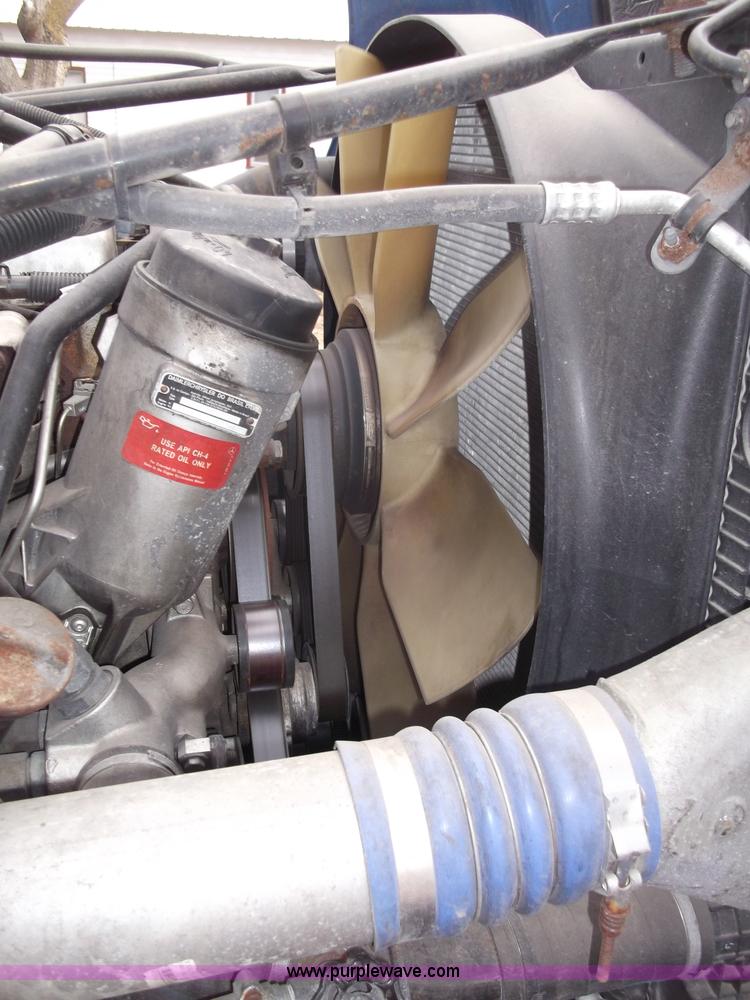 image for item B5076 2004 Freightliner ST120 semi truck