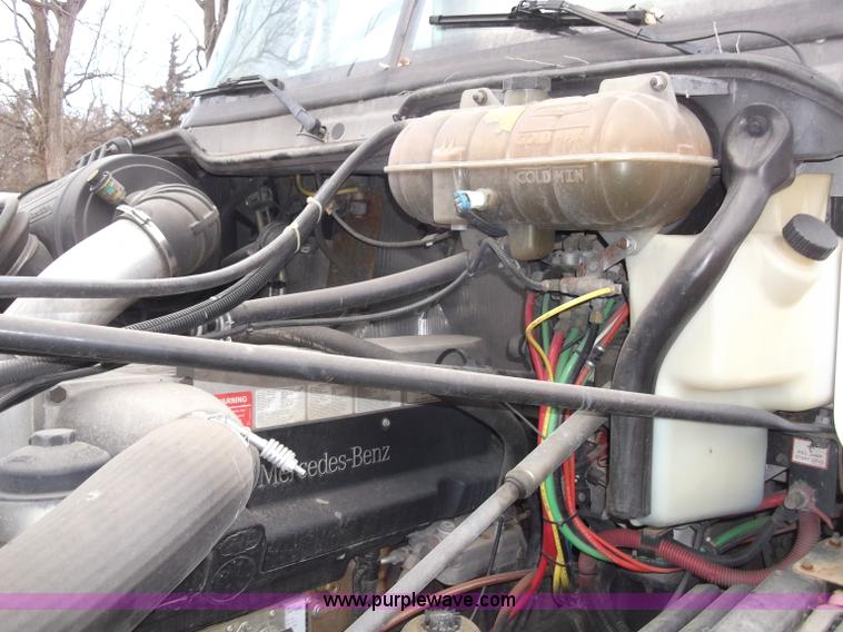 image for item B5076 2004 Freightliner ST120 semi truck