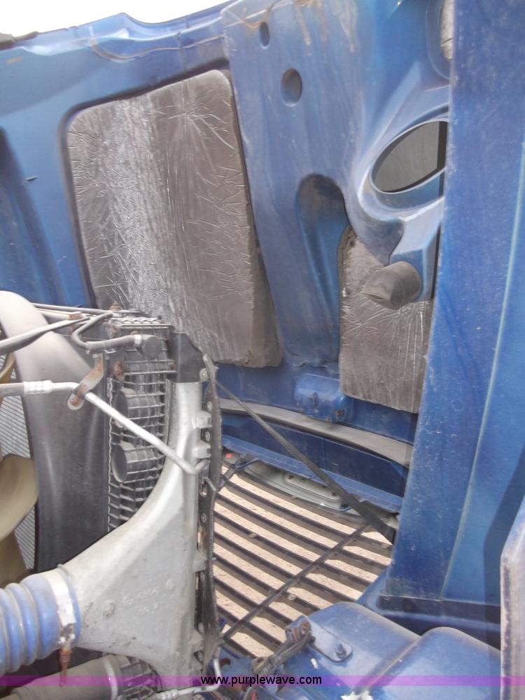 image for item B5076 2004 Freightliner ST120 semi truck