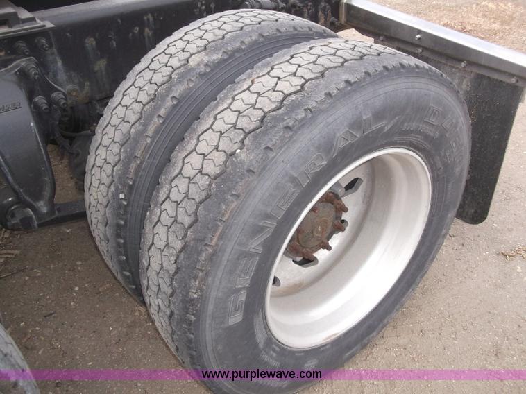 image for item B5076 2004 Freightliner ST120 semi truck