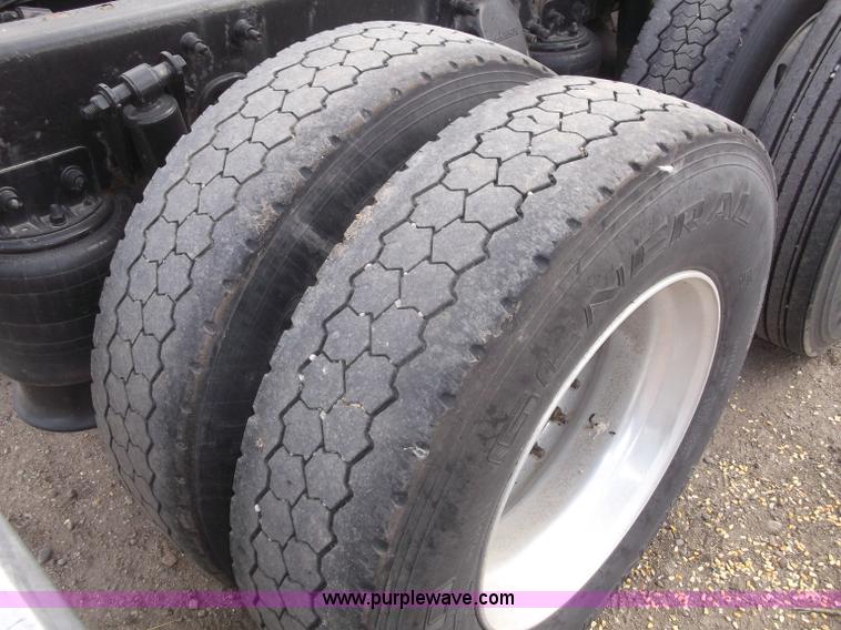 image for item B5076 2004 Freightliner ST120 semi truck