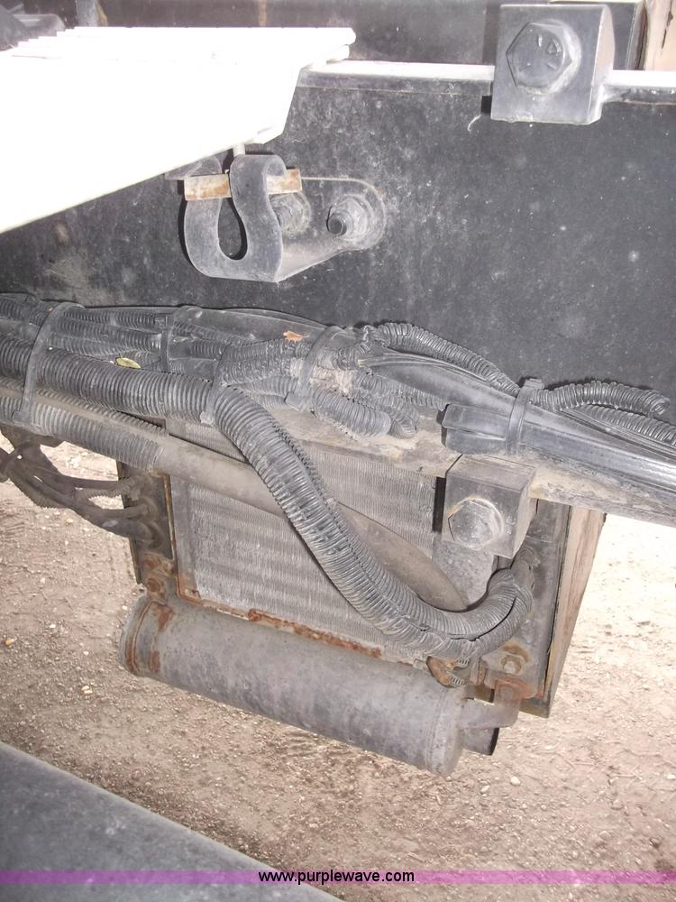 image for item B5076 2004 Freightliner ST120 semi truck