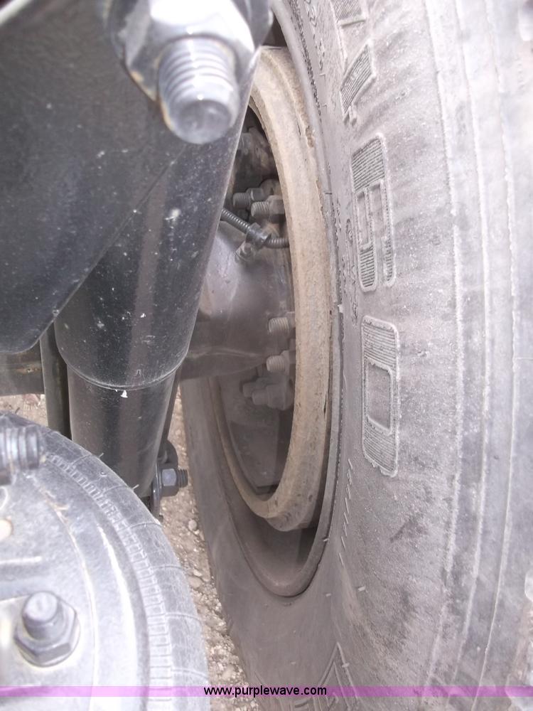 image for item B5076 2004 Freightliner ST120 semi truck