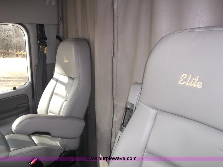 image for item B5076 2004 Freightliner ST120 semi truck