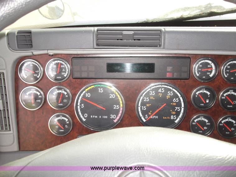 image for item B5076 2004 Freightliner ST120 semi truck