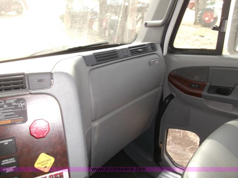 image for item B5076 2004 Freightliner ST120 semi truck