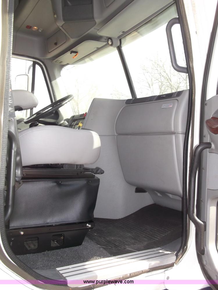 image for item B5076 2004 Freightliner ST120 semi truck