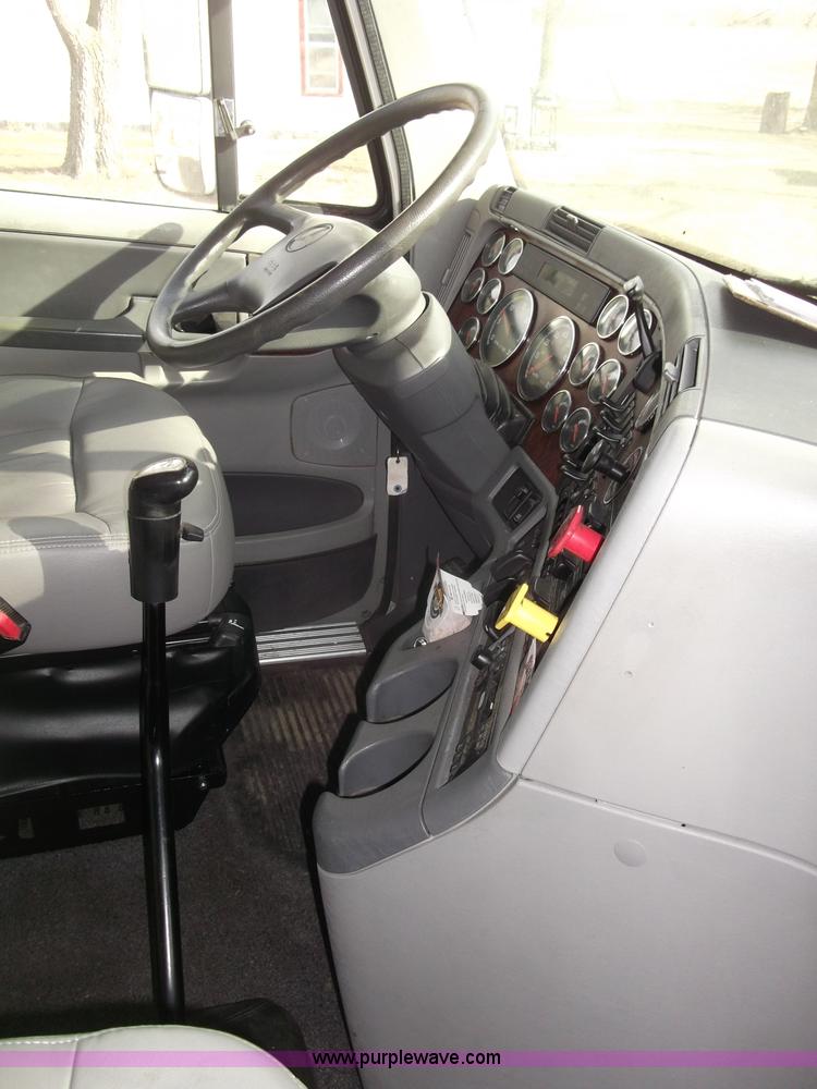 image for item B5076 2004 Freightliner ST120 semi truck