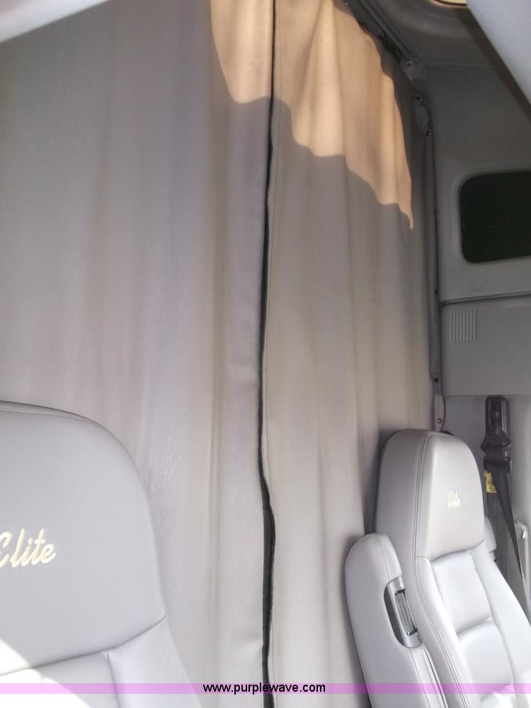 image for item B5076 2004 Freightliner ST120 semi truck