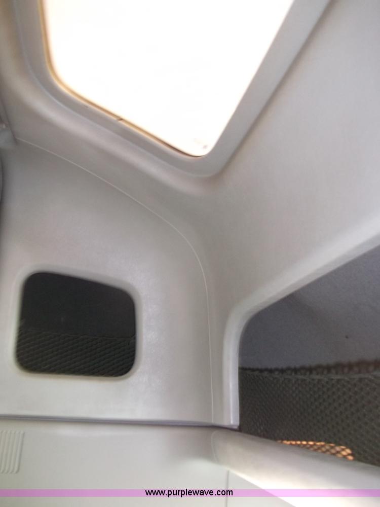 image for item B5076 2004 Freightliner ST120 semi truck