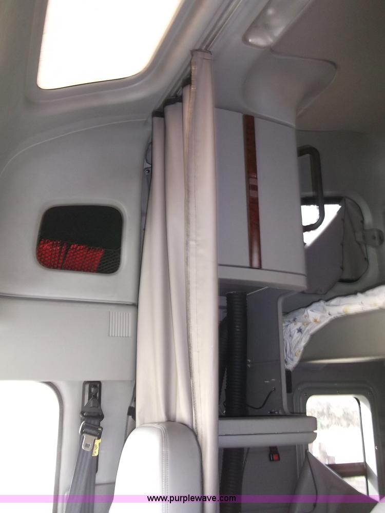 image for item B5076 2004 Freightliner ST120 semi truck