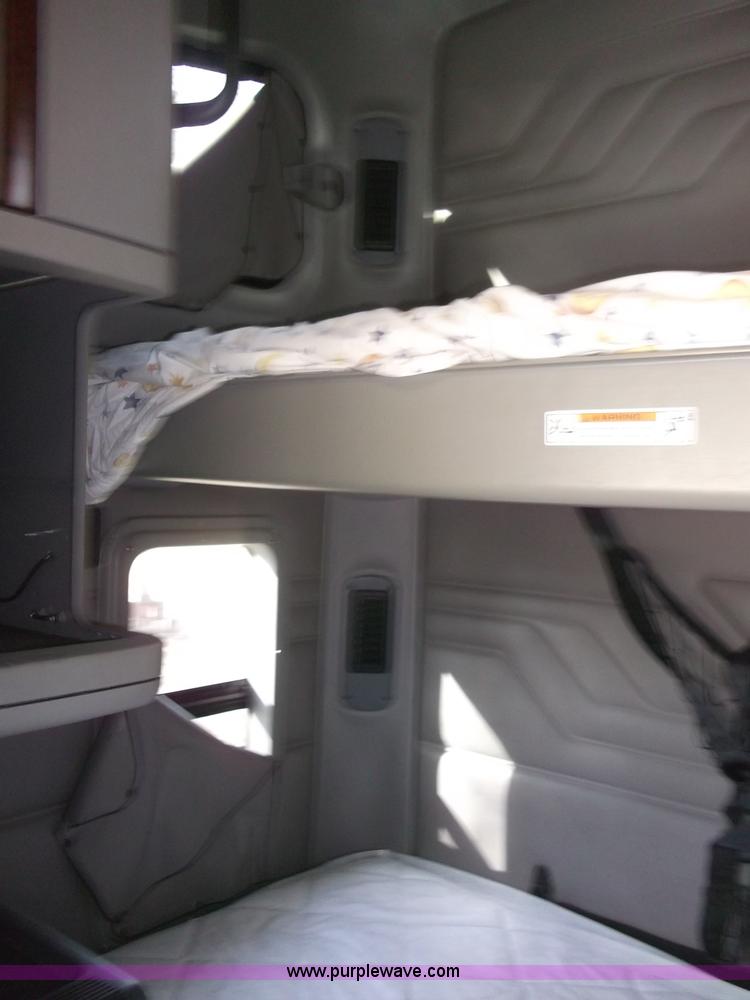 image for item B5076 2004 Freightliner ST120 semi truck