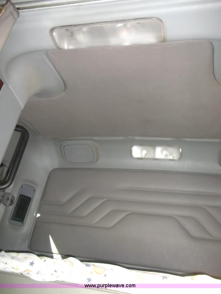 image for item B5076 2004 Freightliner ST120 semi truck