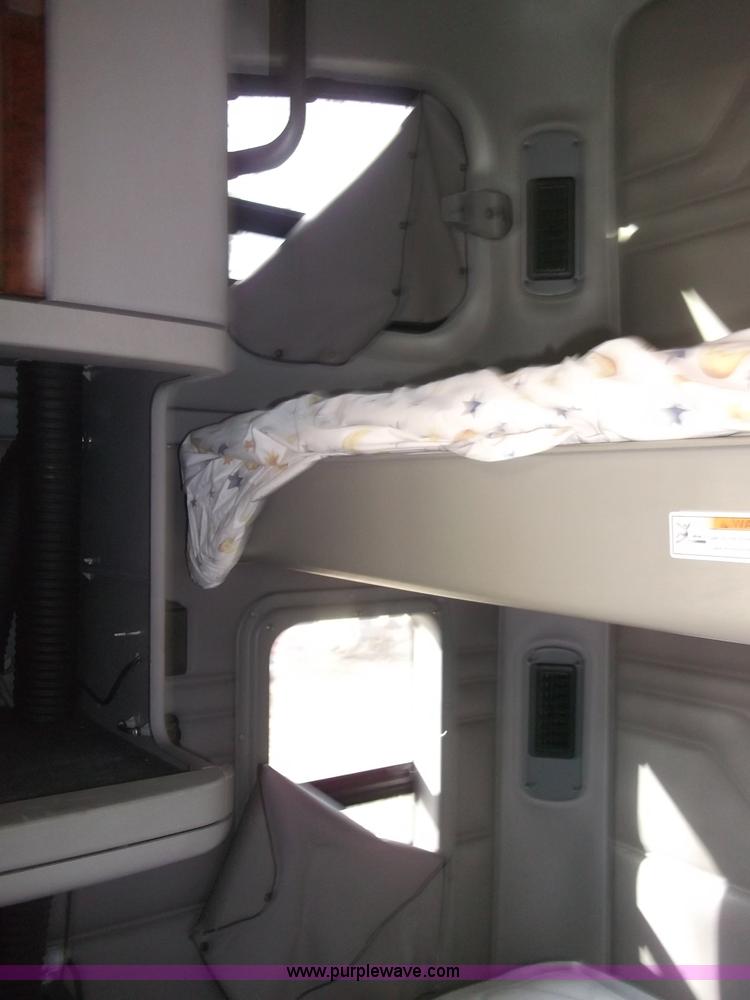 image for item B5076 2004 Freightliner ST120 semi truck