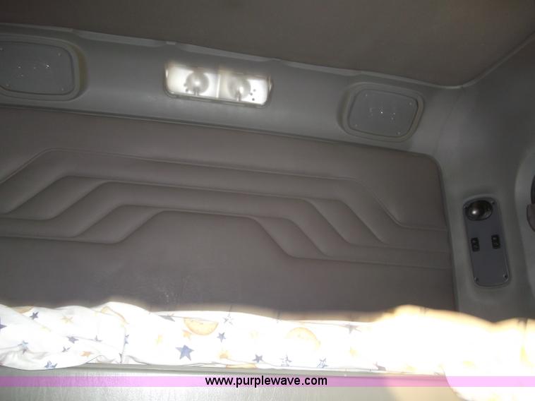 image for item B5076 2004 Freightliner ST120 semi truck