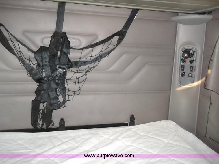 image for item B5076 2004 Freightliner ST120 semi truck