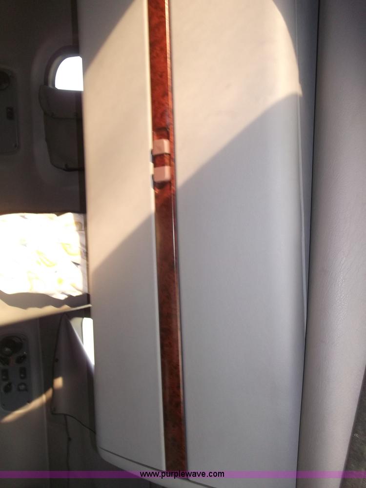 image for item B5076 2004 Freightliner ST120 semi truck