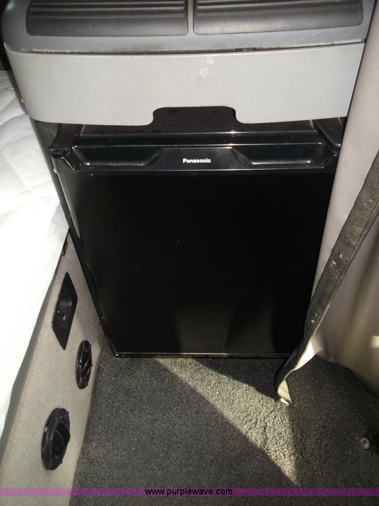 image for item B5076 2004 Freightliner ST120 semi truck