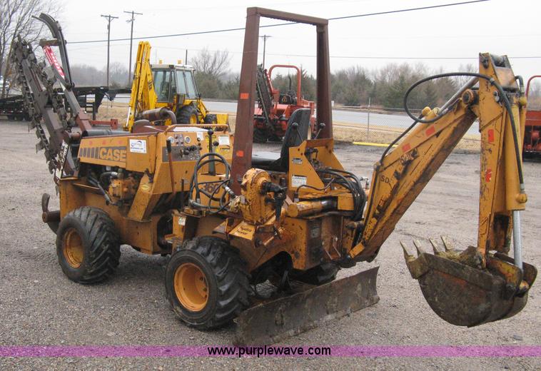 image for item A6015 Case 360 articulating trencher with backhoe attachment