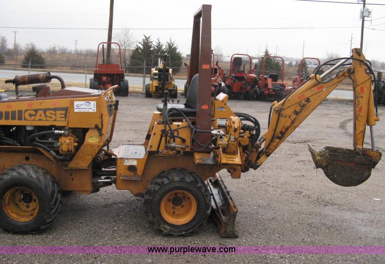 image for item A6015 Case 360 articulating trencher with backhoe attachment