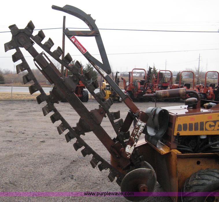image for item A6015 Case 360 articulating trencher with backhoe attachment