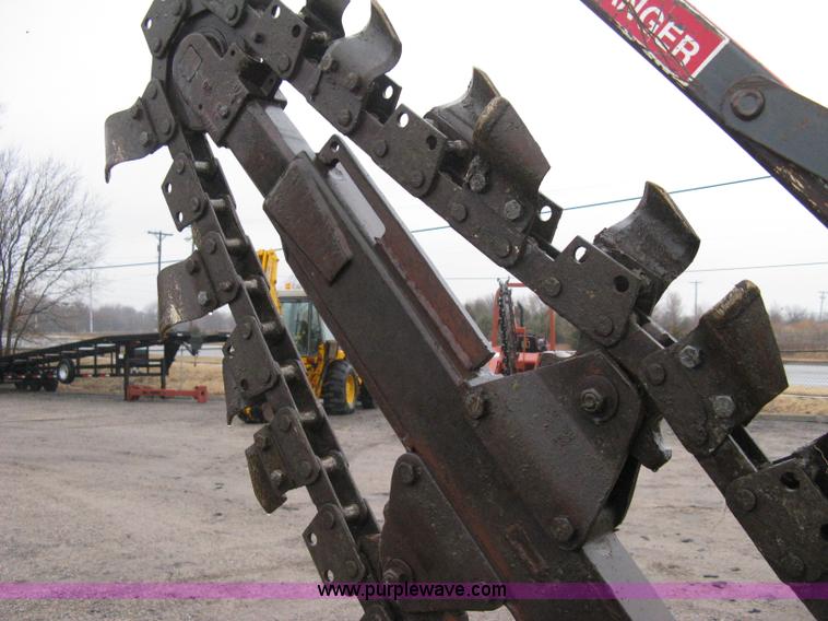 image for item A6015 Case 360 articulating trencher with backhoe attachment