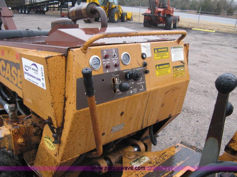 image for item A6015 Case 360 articulating trencher with backhoe attachment