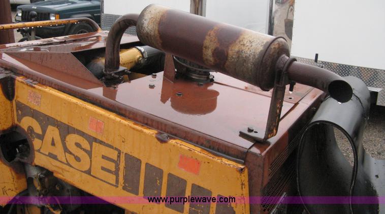 image for item A6015 Case 360 articulating trencher with backhoe attachment