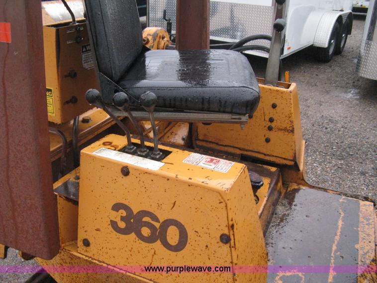 image for item A6015 Case 360 articulating trencher with backhoe attachment